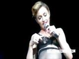 Celeb madonna flashing her bare breasts onstage during